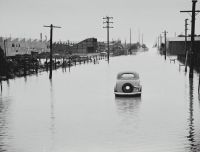 Flood Evacuation H.V McKay Massey Harris, Factory Flood, Sunshine, Victoria, 1946 grey,flood,analogue photography