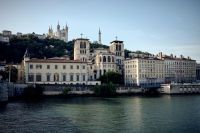Lyon skyline Captivating Lyon skyline reflected in Rhone River, showcasing city's historic landmarks. 
