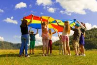 Summer activities children camp entertainment activity, education and training idyllic wallpaper poster concept in picturesque sunny green nature landscape environment space 