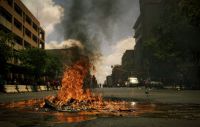 fire protest During 2016 South Africa experienced many protests. Most of them were around tertiary education fees. In November 2016, the Economic Freedom Fighters (EFF) party of South Africa took to the streets of Pretoria.

It was mostly calm as the EFF had several marshals walking with the various clusters. Despite the massive police presence, there were a handful of vandals and pyromaniacs around. 

I also got pelted with a few stones in the process. 
