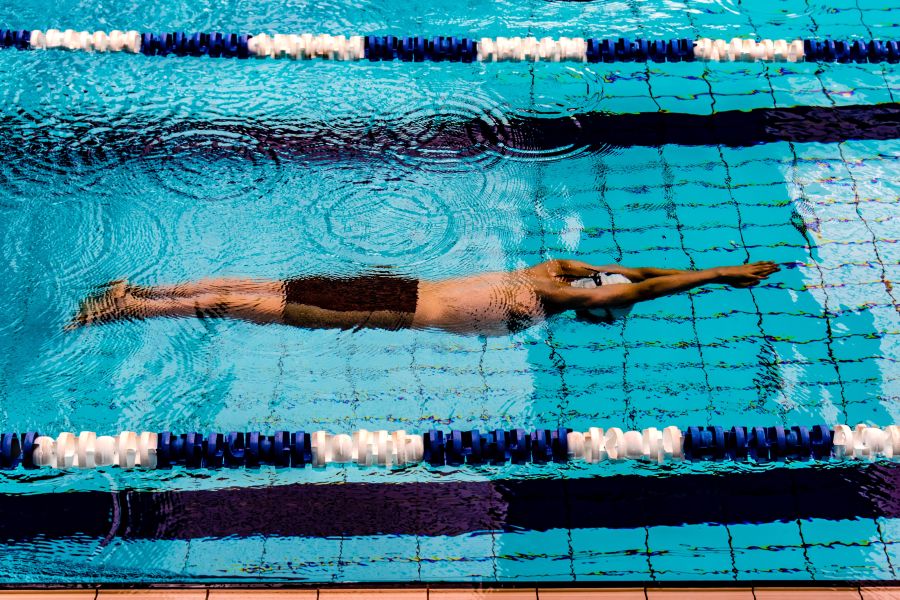 carpool lane Children swimming competitively start at a very young age, and by 12 years old, they can spend 8-11 hours a week in the pool. It is very tough for the kids and their parents to juggle school, swimming and, well, the rest that goes on in people’s lives.
This young lad is already a competitive swimmer at a regional level in England at 13!
Here he is seen in a streamline about to explode in a bout of energy. blue,sport,water