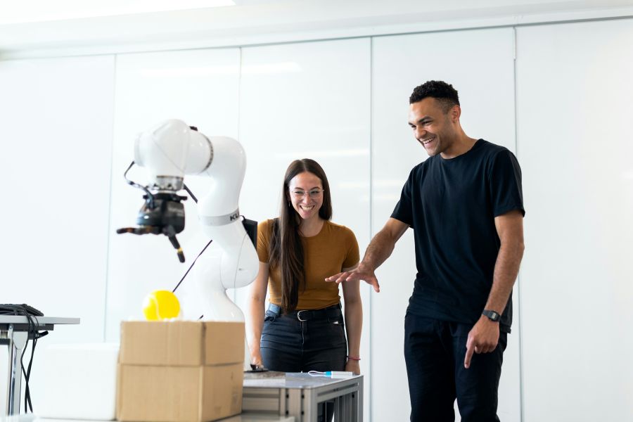 robotics Engineers work with medical robotic equipment 