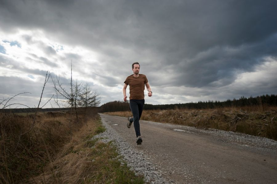 Running Charlie, hoping to beat the storm. running,runner,exercise