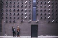 Safety security Women look at security cameras security,toronto,grey