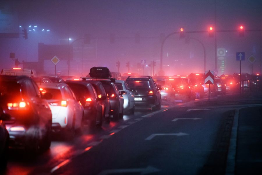 Traffic jam Smog and heavy trafić at night. kraków,poland,pollution