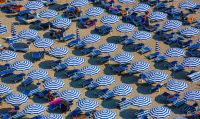 Vacations Holidays Beach in white and blue tourist,umbrella,sunshade