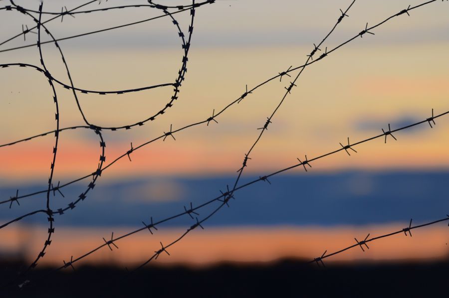 Exclusion Sunset in the exclusion zone wire,barbed wire,utility pole