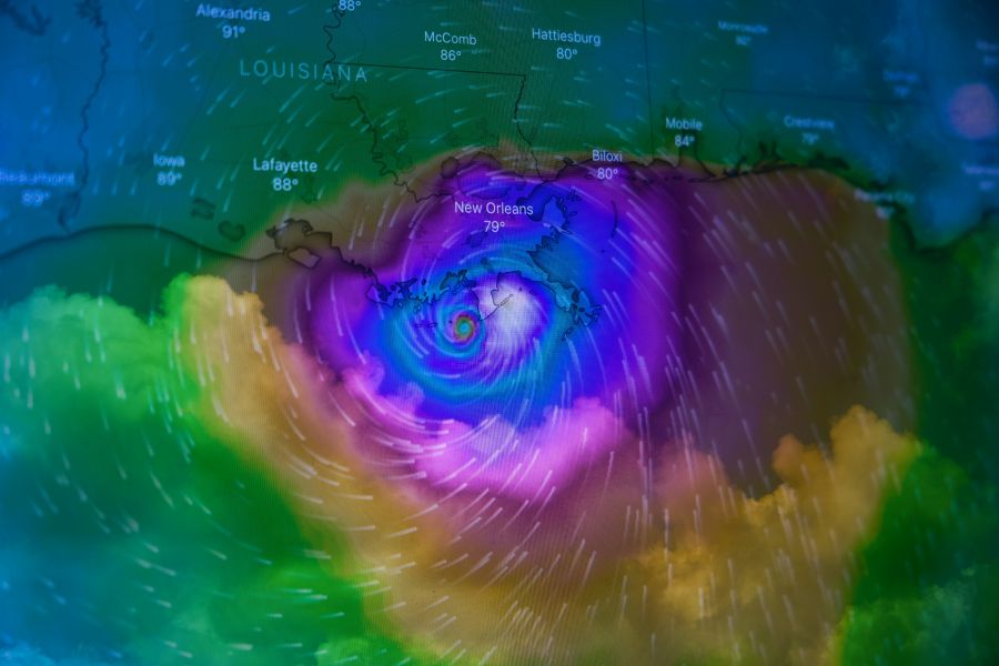 Weather Forecast Double exposure of Hurricane Ida approaching New Orleans on August 29, 2021. weather,new orleans,current events