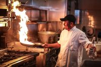 Chef  cooking with gas,flambe,cooking with fire