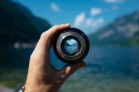 Opportunity Mountain lake in camera lens website,focus,hallstatt