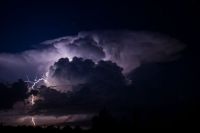 weather storms Single cell thunderstorm cloud to ground strike with impressive illuminated structure.  lightning,weather,thunderstorm
