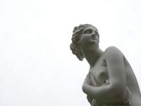 Statue Bernard Sculpture of a lady hiding her body behind a piece of fabric. statue,sculpture,grey