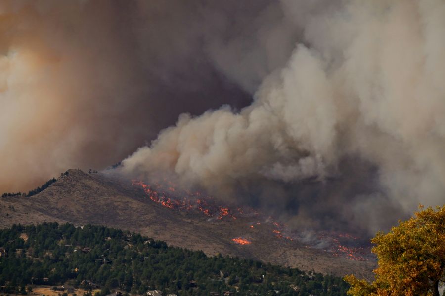 Wildfire Taken on the day the calwood fire started from the peak to peak highway. Showing the smoke plume created from the fire after growing to 8000 acres within the first 5 hours. grey,current events,climate