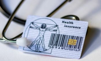 healthcare access a health card and a stethoscope