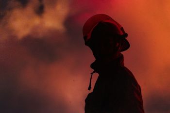 Wildfires Firefighters firefighter silhouette with smoke and light
