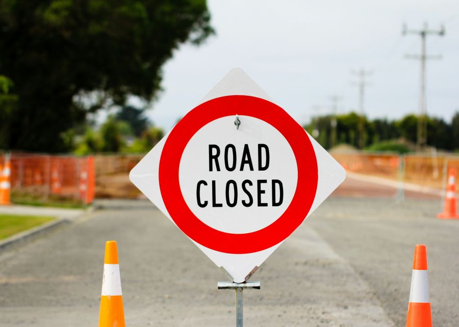 School closure Road Closed sign on street 