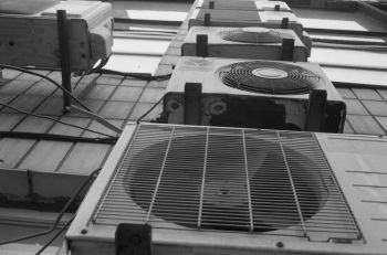 cooling center some AC units on the wall. 2023 Olympus trip 35/ Kentmere 400