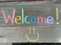 Welcome Day Welcome written with chalk 