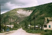 Landslide Yukon Territory, Canada Streetscene and landslide at mountain side; Dawson, Yukon Territory, Canada. 