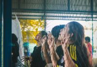 ambassador ambassador A bunch of supporters give chants to support their team. futsal field,malang,indonesia