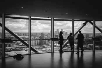business meeting near a transparent glass 