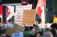 Nazi flag Demonstration gegen die AfD (Alternative für Deutschland) und gegen Rechts in Marburg, Deutschland afd,beige,people
