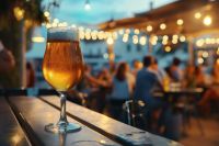 Restaurant summer An unforgettable summer's day that ends with a perfectly tapped glass of beer in a beautiful bar on the edge of the coastal town. 