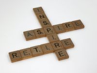 Retirees scrabble, scrabble pieces, lettering, letters, wood, scrabble tiles, white background, words, quote, letters, type, typography, design, layout, focus, bokeh, blur, photography, images, image, aspire, inspire, retire, inspiration, teaching, life cycle, teacher, life coach, life, get out of the way, wisdom, life wisdom, live and learn,  game,grey,domino
