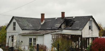 fire damage Abandoned home destroyed by fire