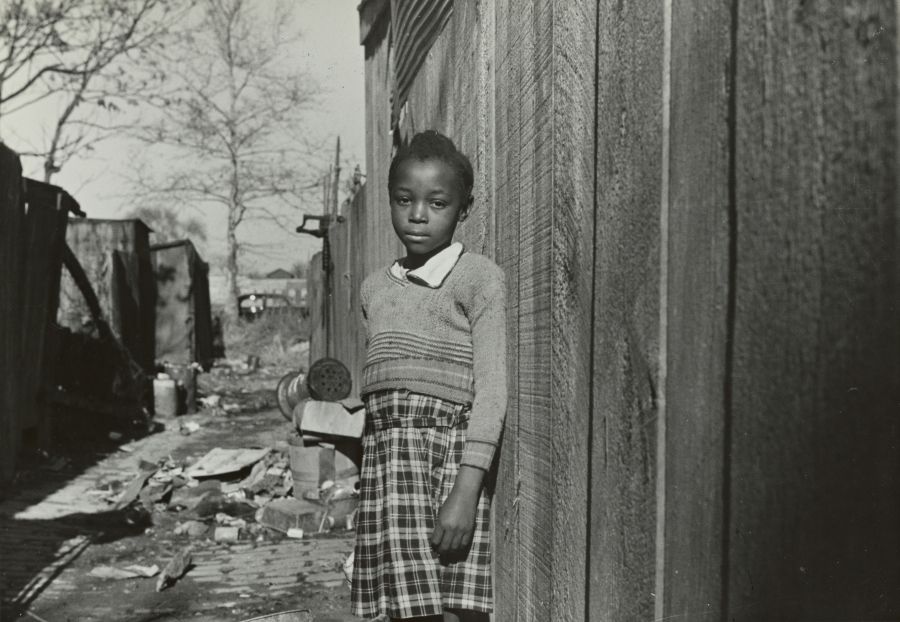 Slum Shantytown 1937.
Girl in Washington, D.C. slum area
Photographer: John Vachon  grey,slum,child