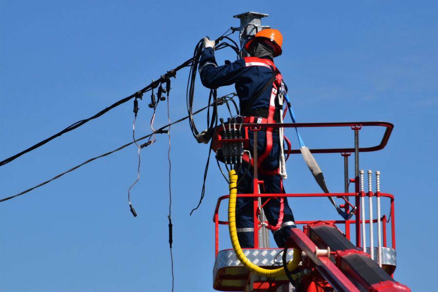 Power outage Electrician is repairing the wires cable,transmission,power