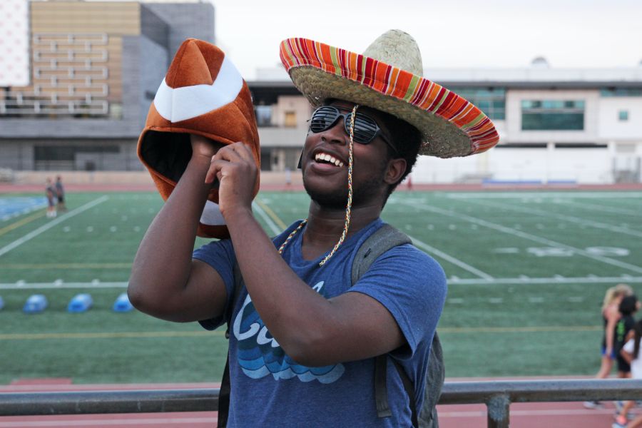 Football supporters A photo of myself, taken at Santa Monica College (close to where my last photo was taken), being silly and combining different props for the “Alternative Portraiture” assignment in my Photo 1 class at the school. supporter,promoter,cheering