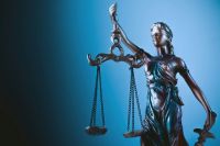 justice trial Statue of justice with scales of justice, legal system concept. 