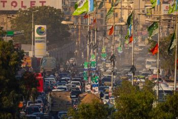 Election City An urban symphony of wires, banners, traffic, and Karachi’s everyday chaos.