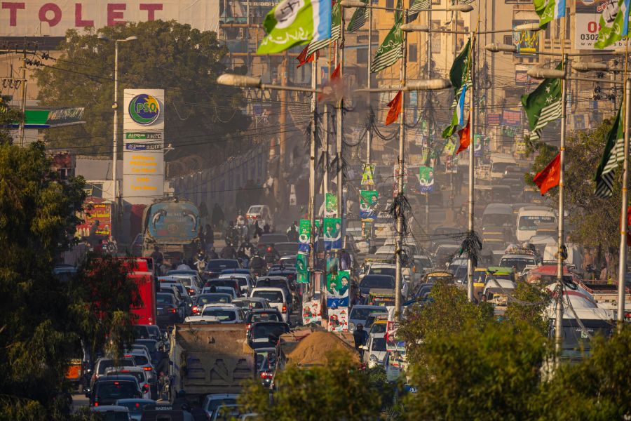 Election City An urban symphony of wires, banners, traffic, and Karachi’s everyday chaos. 