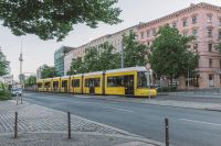 tram heat Tram in Berlin, Germany with the television tower in the background.  