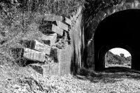 Train accident Old retaining wall at train tunnel in Vicksburg. arch,gravel,train