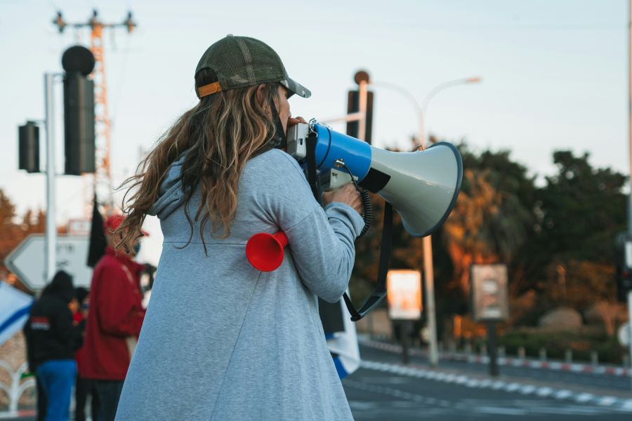 Strike Woman with a megaphone at a protest