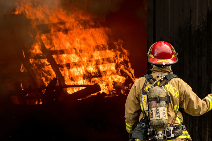 Firefighters Lieutenant observing the practice fire fire,helmet,firefighter