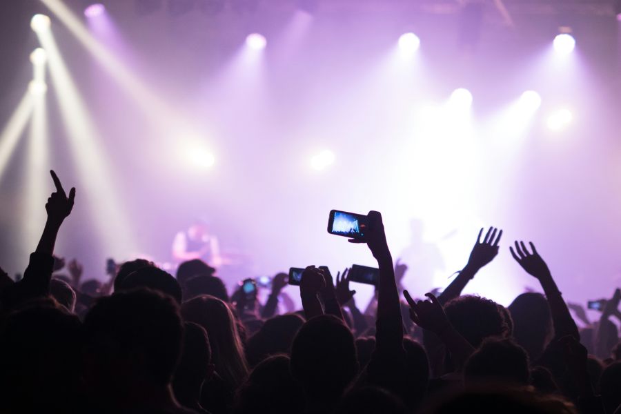 Festival Camera Crowd filming concert with smartphone 