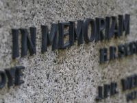 memory grief Headstone with in memoriam written on it 