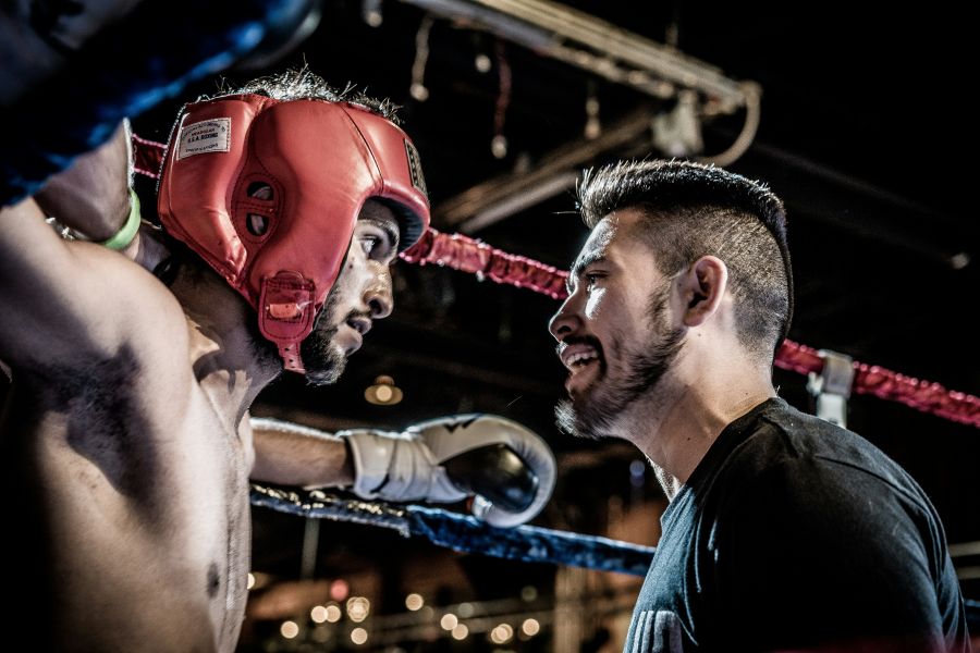 MMA My friend Mo was fighting so he invited me to come along.  I took this picture of his coach and him in-between rounds.  Mo ended up winning the fight in a unanimous decision by the referee. 