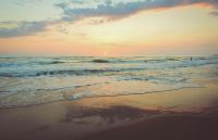 Beach San Lorenzo sunset reflected in the sea 