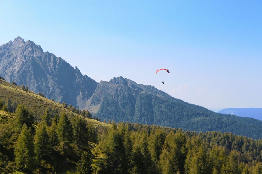 Mountain adventure Paraglider over mountains italy,mountain,Explore