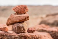 Rock pile of stones idyllic outdoor concept wallpaper background pattern with empty copy space for text or inscription  copy space,stack,white