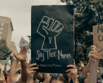 protest racism Woman holds up a sign at the Black Lives Matter protest in Washington DC 6/6/2020 (IG: @clay.banks) 
