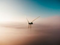 wind farm Early morning windmill sunrise in the mist 