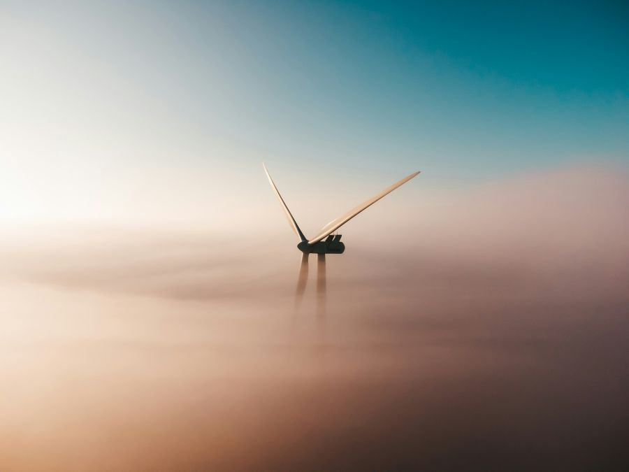 wind farm Early morning windmill sunrise in the mist 