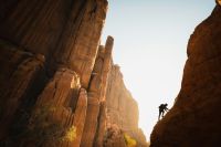 Climbing Cancer Amongst expansive red sands and spectacular sandstone rock formations, Hisma Desert – NEOM, Saudi Arabia | The NEOM Nature Reserve region is being designed to deliver protection and restoration of biodiversity across 95% of NEOM climbing,adventure