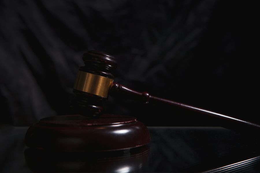 crime court gavel in the dark background. law concept 